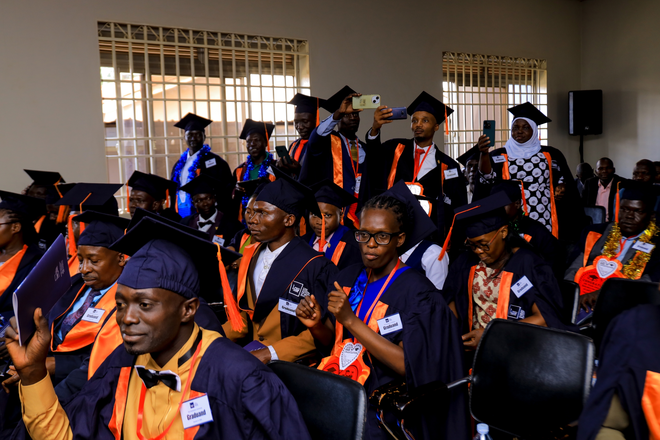Happy graduates capture the historical moments